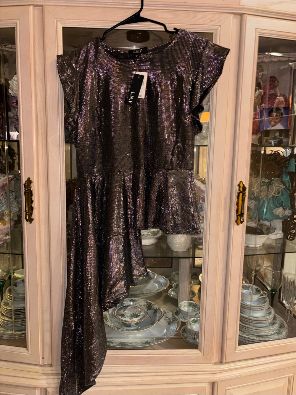 Metallic Asymmetric Peplum Blouse in Iridescent Black